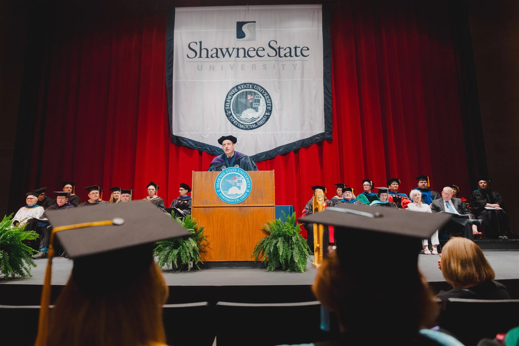 President Eric Andrew Braun addressing campus