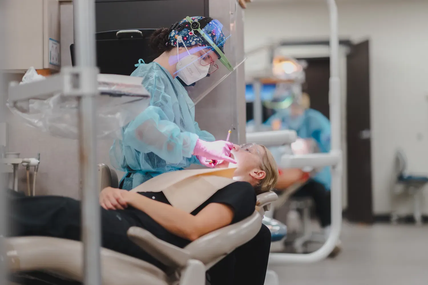 dental student working on a patient