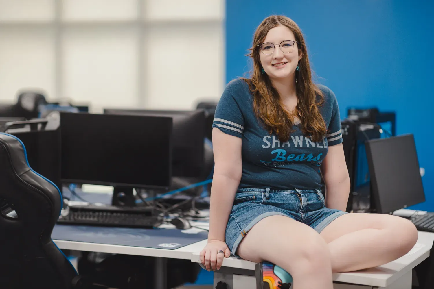 Student smiling in the computer lab