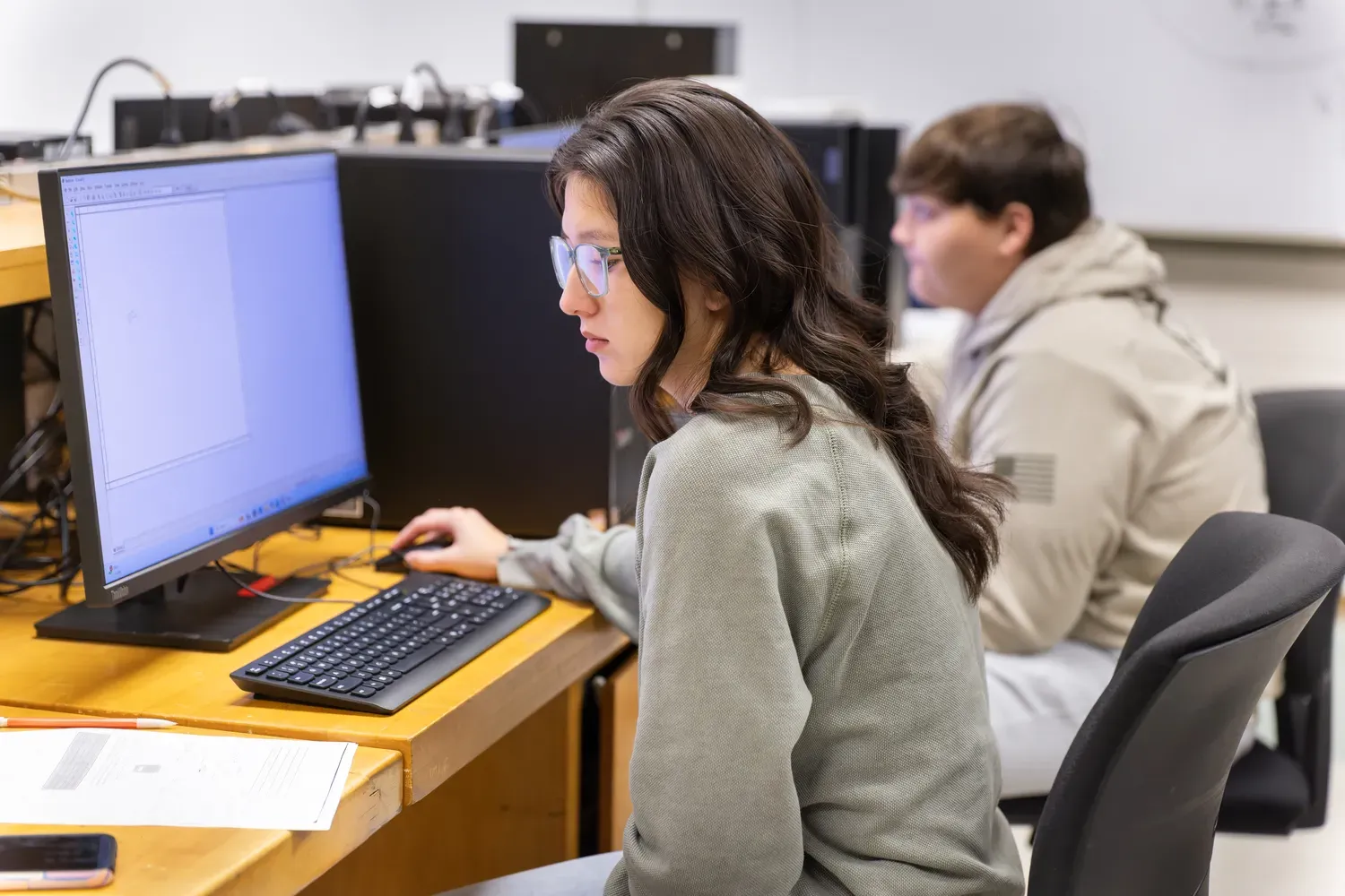 students working at a computer