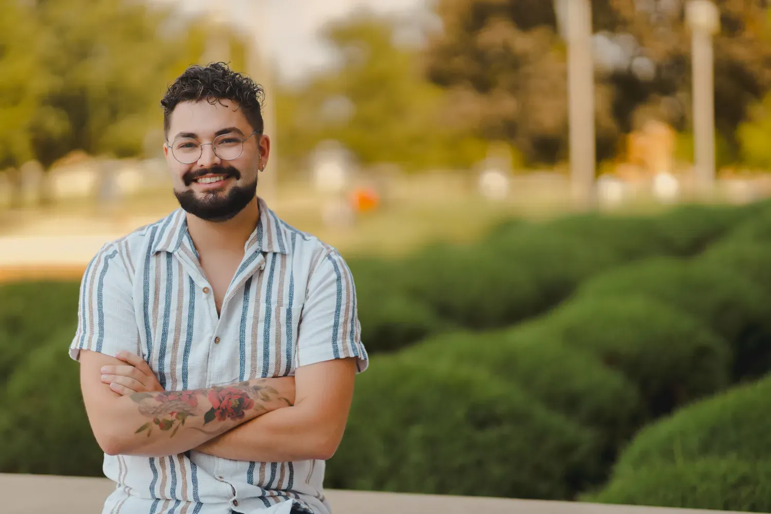 Student smiling outside