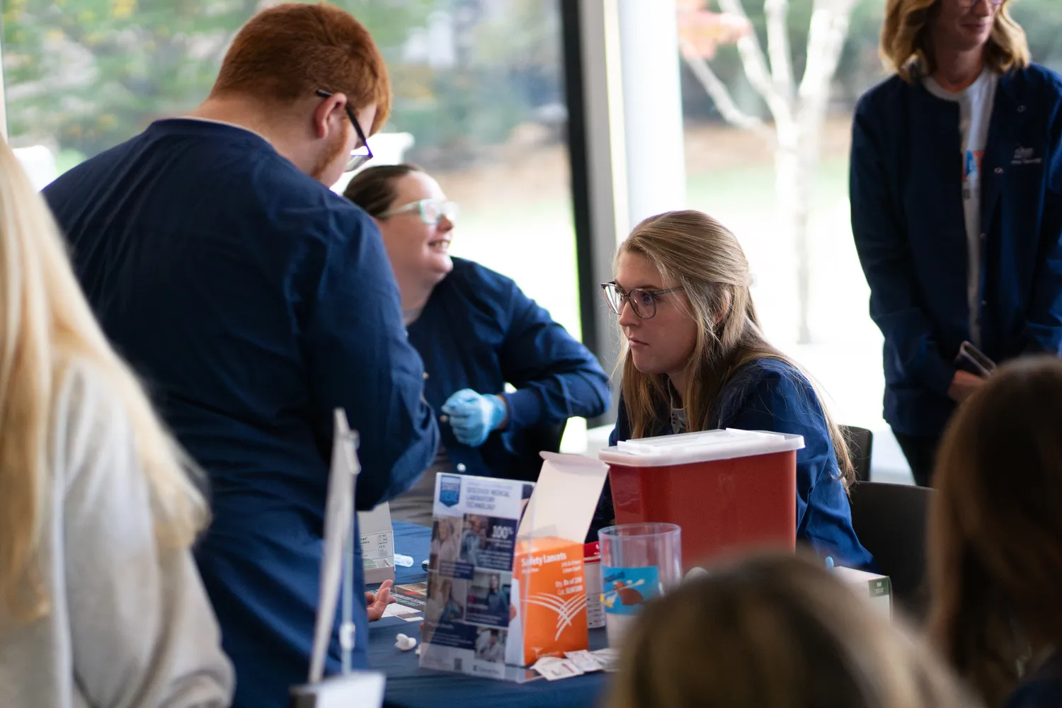 Students working at the health fair