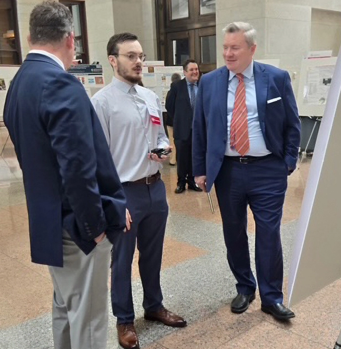 Parker Lauders displaying his research at the Ohio Statehouse
