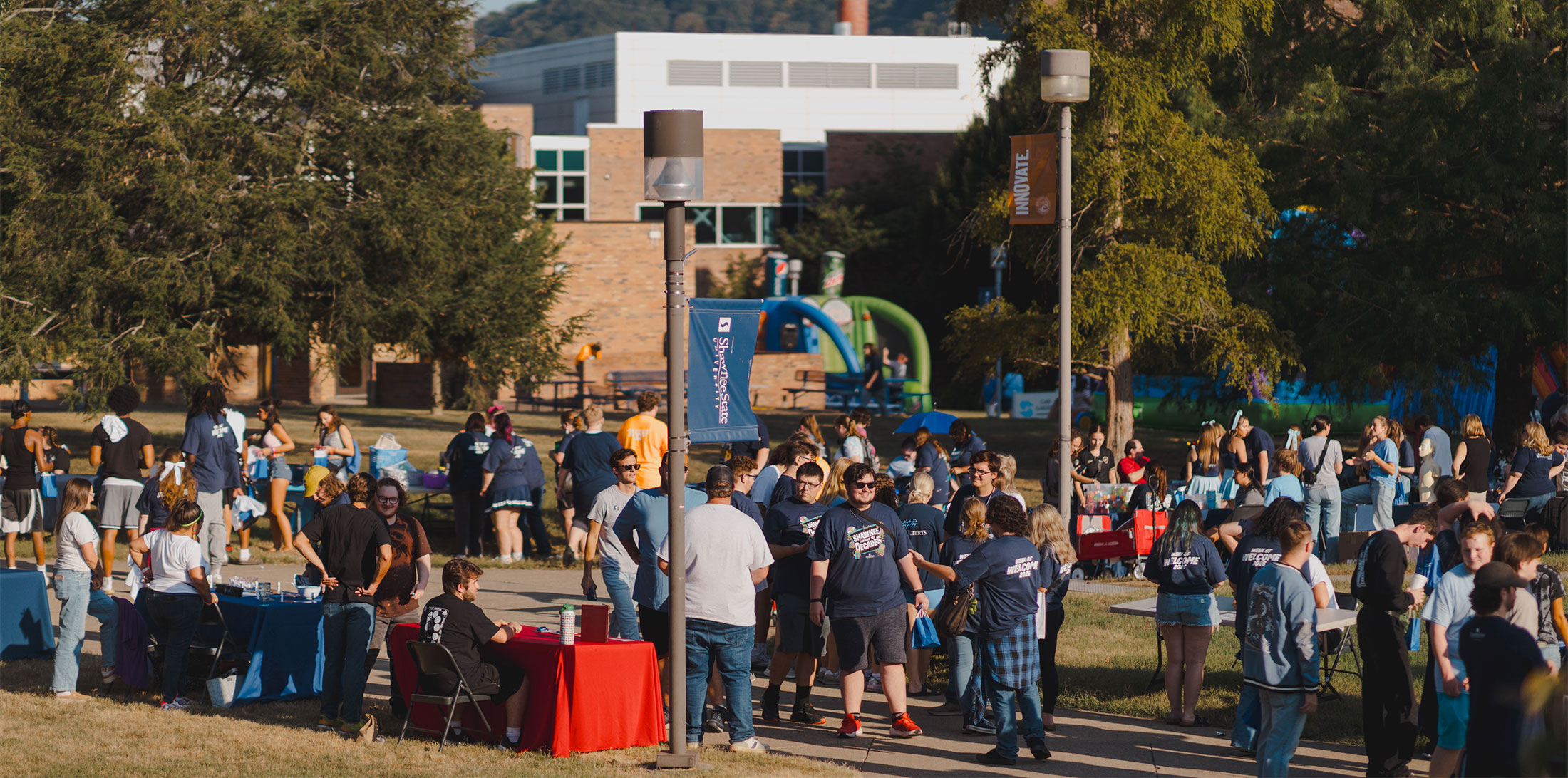 Large crowd of people on campus for Weekend of Welcome 2025