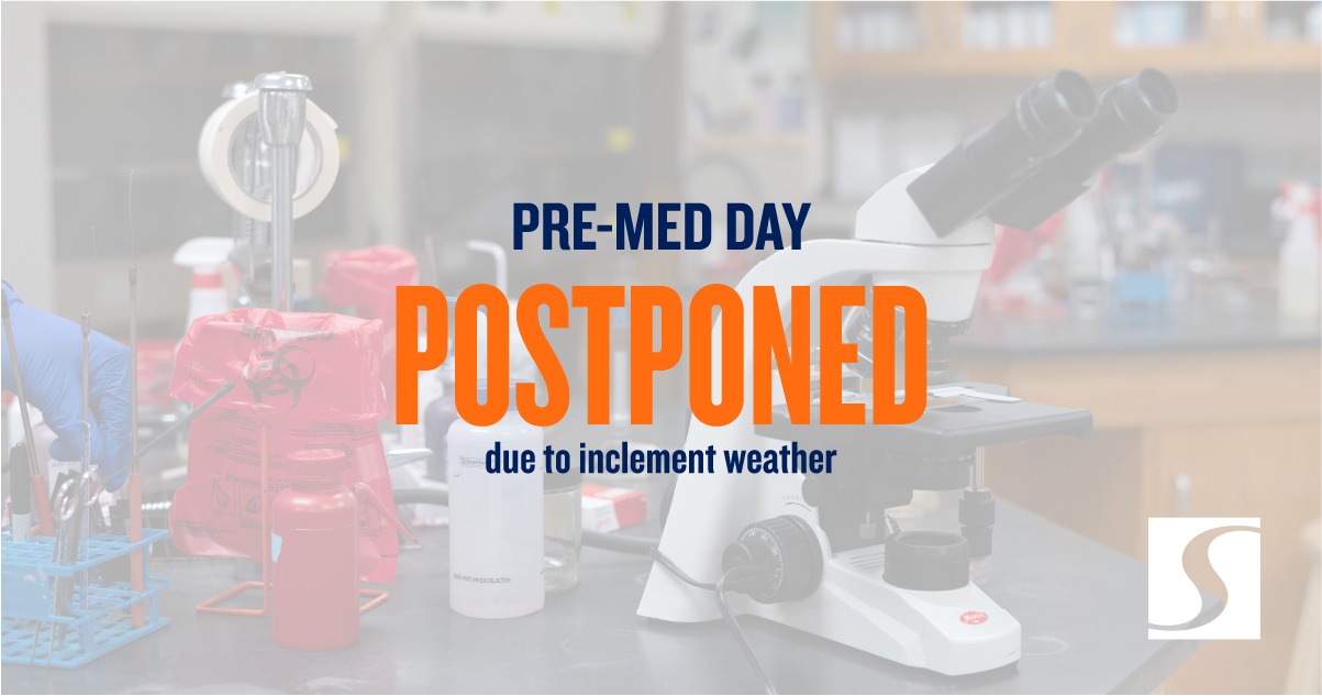Text on a picture of a lab that reads "Pre-med day postponed due to inclement weather"