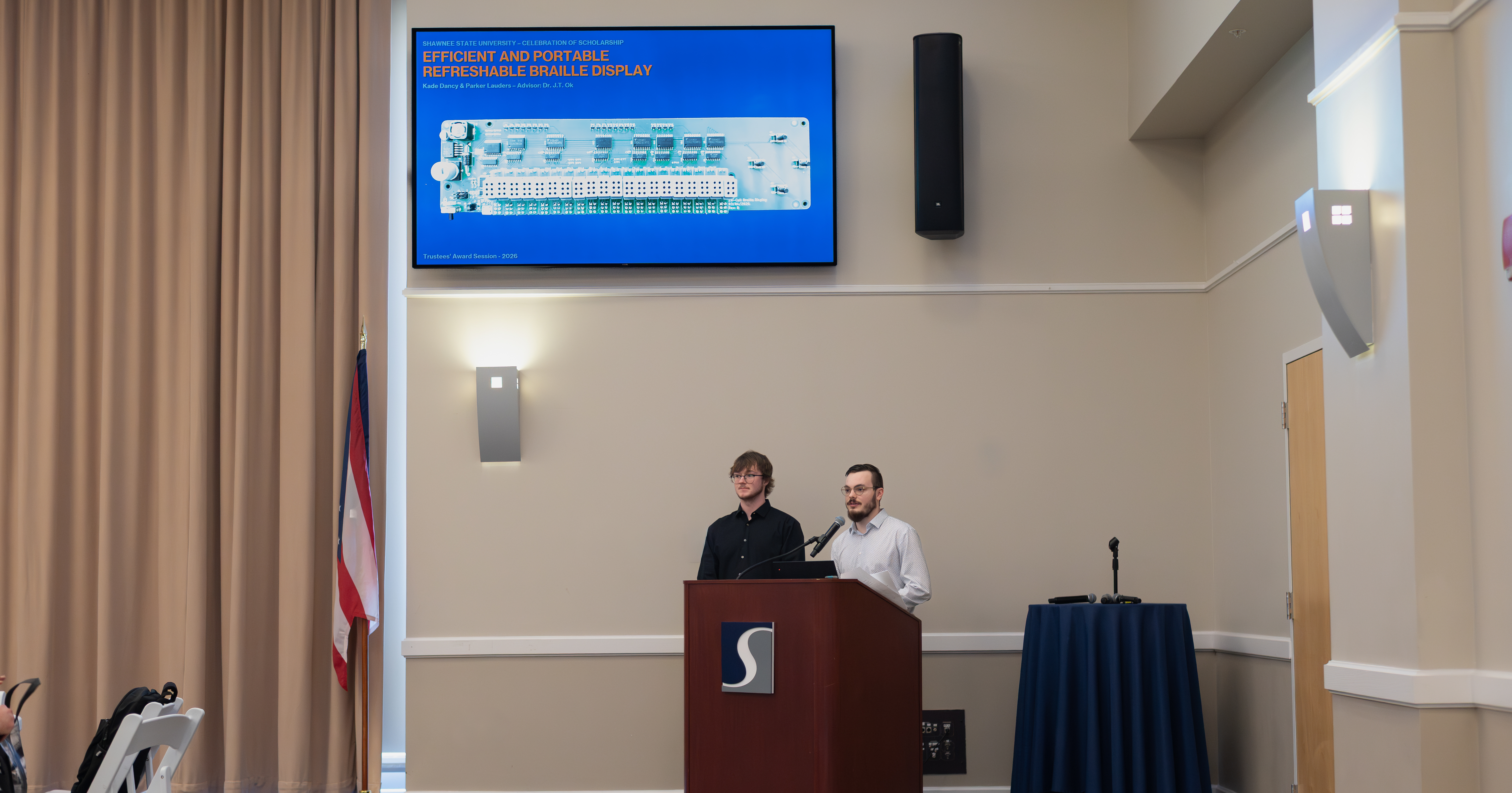 Lauders and Dancy presenting their refreshable braille display at Shawnee State's Celebration of Scholarship.